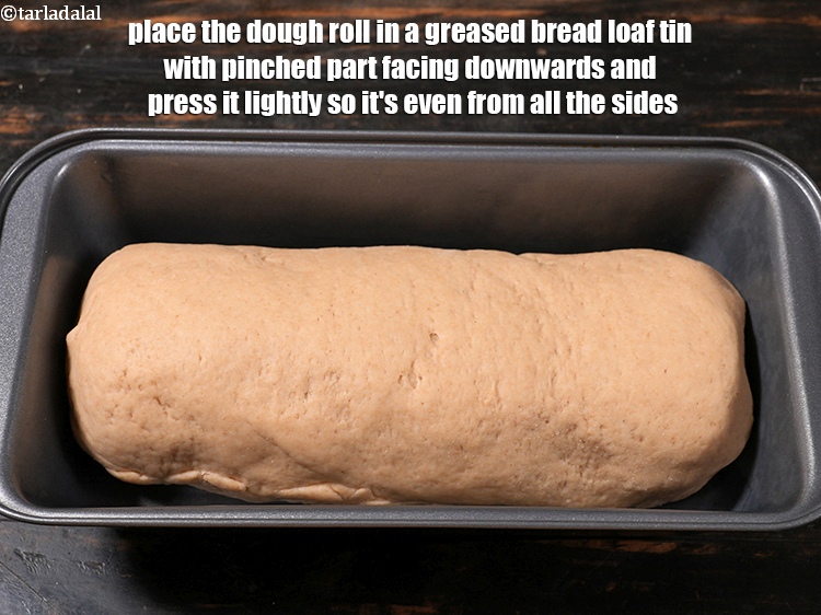 Step 27 – Place the dough roll in a greased <strong>bread loaf</strong> tin with pinched part facing downwards …