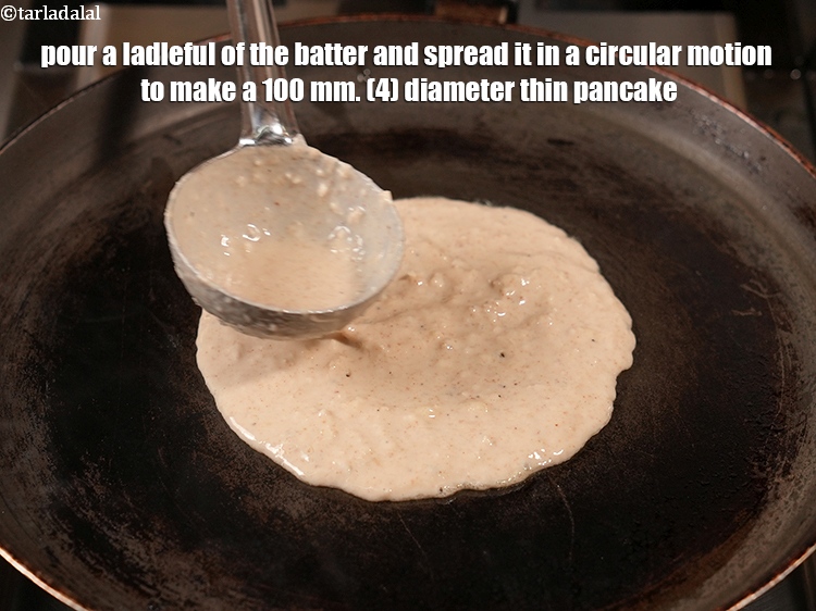 Step 22 – Pour a ladleful of the batter and spread it in a circular motion to make …