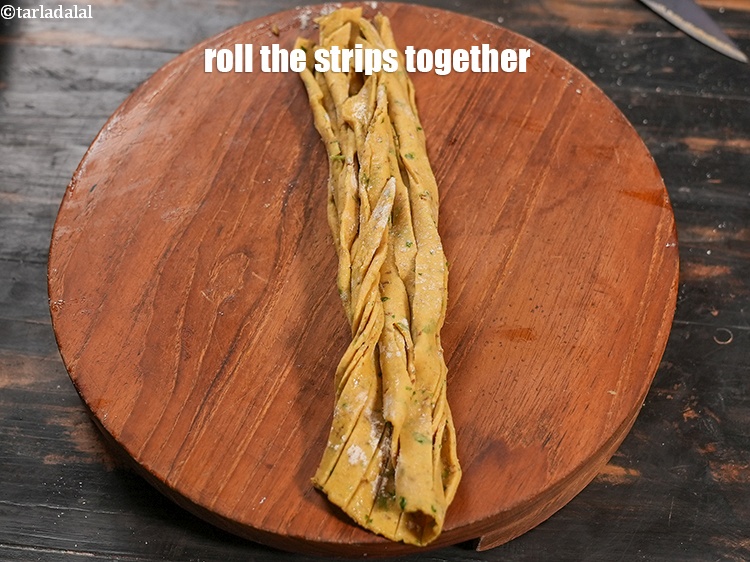 Step 22 – Roll the strips together.&nbsp;