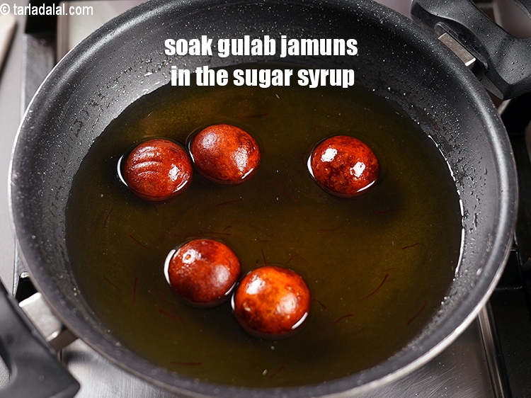 Step 23 – Soak the gulab jamuns in the sugar syrup for at least &frac12; hour.
