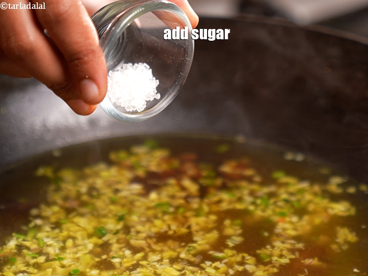 Step 22 – Add &frac12; tsp <a href="https://www.tarladalal.com/glossary-sugar-chini-shakkar-278i">sugar</a>.