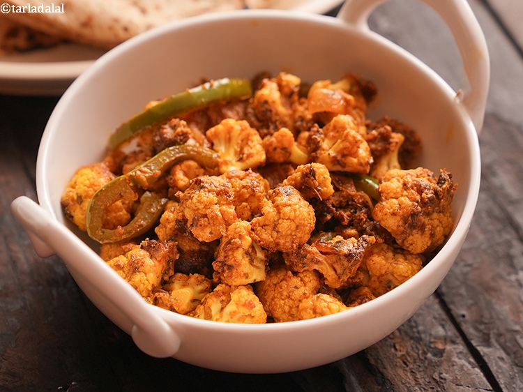 Step 22 – <strong>Tandoori Gobi Sabzi</strong> is a flavorful and healthy Indian dish featuring roasted cauliflower florets and …