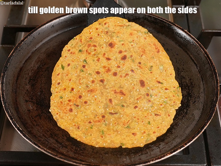 Step 22 – Till golden brown spots appear on both the sides.