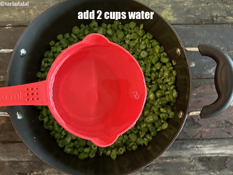 Step 22 – <p>Add <strong>2&nbsp;cups&nbsp;</strong>of water. This will give the fansi dhokli a nice gravy. If you want …