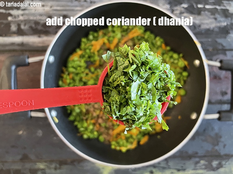 Step 31 – Add&nbsp;<meta charset="UTF-8" />2 tbsp&nbsp;finely&nbsp;<a href="glossary-chopped-coriander-783i">chopped coriander (dhania)</a>.