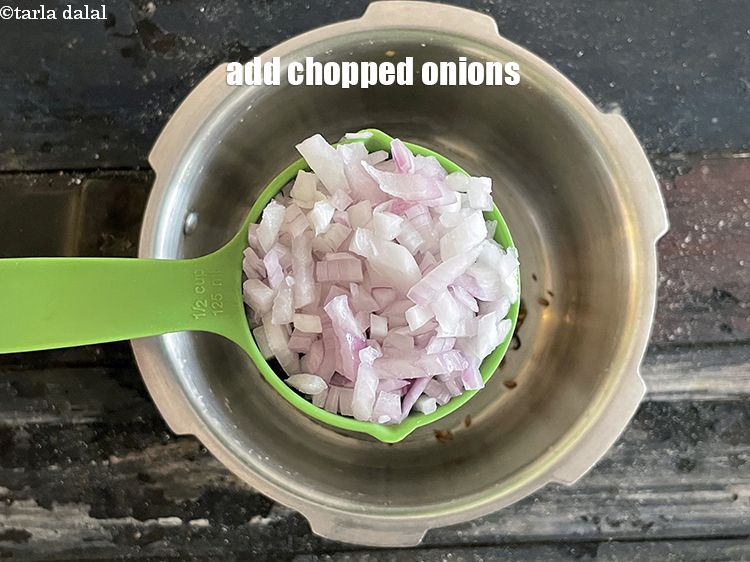 Step 22 – Add&nbsp;<meta charset="UTF-8" />1/2 cup&nbsp;<a href="glossary-chopped-onions-722i">chopped onions</a>.