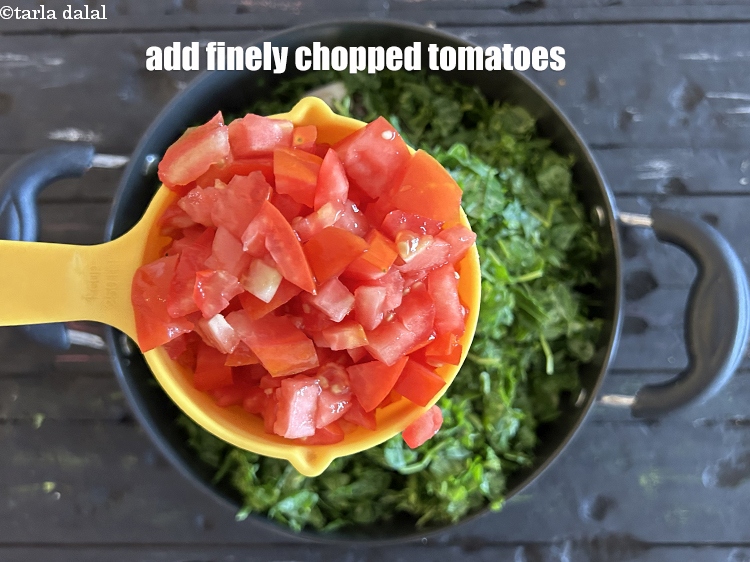 Step 23 – Add&nbsp;1 cup finely chopped tomatoes.