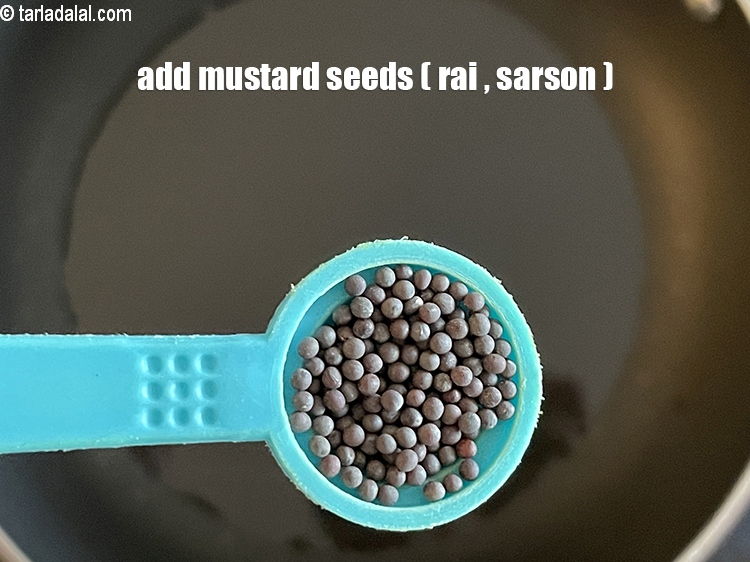 Step 22 – Add&nbsp;<meta charset="UTF-8" />1/2 tsp&nbsp;<a href="glossary-mustard-seeds-sarson-rai-sarson-ke-beej-525i">mustard seeds ( rai / sarson)</a>.