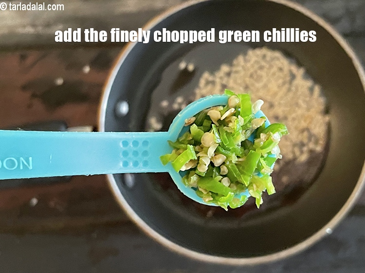 Step 22 – Add&nbsp;<meta charset="UTF-8" />1/2 tsp&nbsp;finely&nbsp;<a href="glossary-chopped-green-chilli-820i">chopped green chillies</a>.