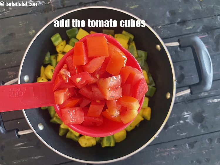 Step 24 – Add&nbsp;<meta charset="UTF-8" />1 cup&nbsp;<a href="glossary-tomato-cubes-728i">tomato cubes</a>.