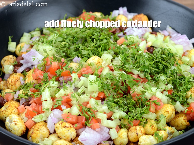 Step 23 – Add 2 tbsp finely <a href="https://www.tarladalal.com/glossary-chopped-coriander-783i">chopped coriander (dhania)</a>.