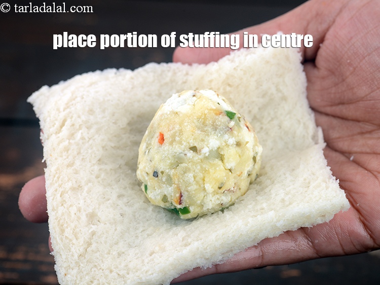 Step 22 – Place a portion of the stuffing in the centre.