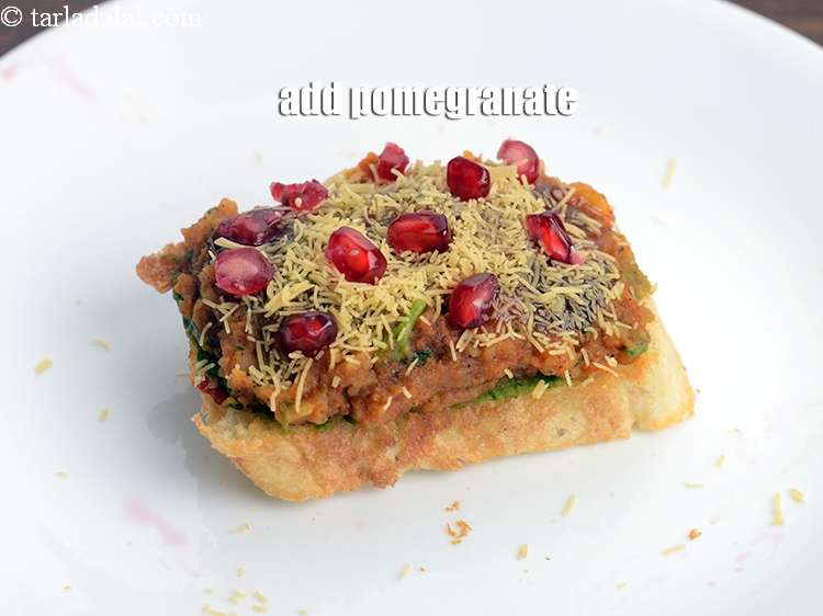 Step 21 – Add 1 tsp <a href="https://www.tarladalal.com/glossary-pomegranate-anar-587i">pomegranate (anar)</a>.