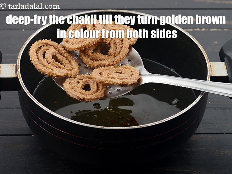 Step 22 – Deep-fry the chakli over a slow flame till they turn golden brown in colour from …