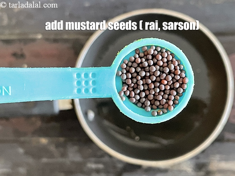 Step 22 – Add&nbsp;<meta charset="UTF-8" />1/2 tsp&nbsp;<a href="glossary-mustard-seeds-sarson-rai-sarson-ke-beej-525i">mustard seeds ( rai / sarson)</a>.