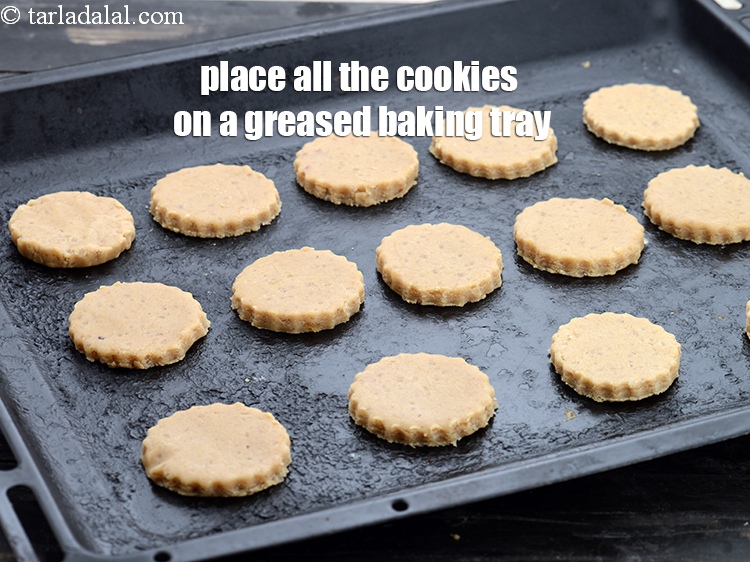 Step 22 – Place all the cookies on a greased baking tray.