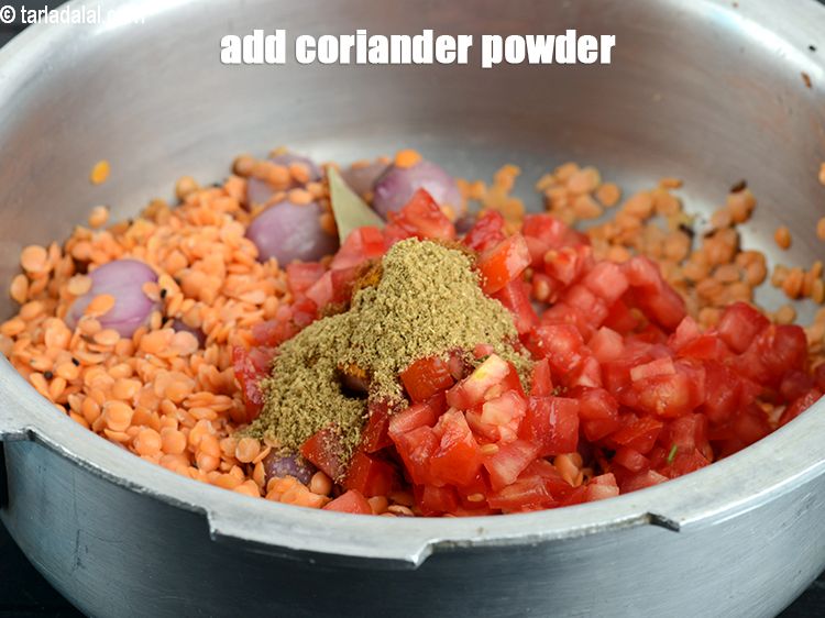 Step 22 – Add &frac12; tsp <a href="https://www.tarladalal.com/glossary-coriander-powder-dhania-powder-370i">coriander (dhania) powder</a>.