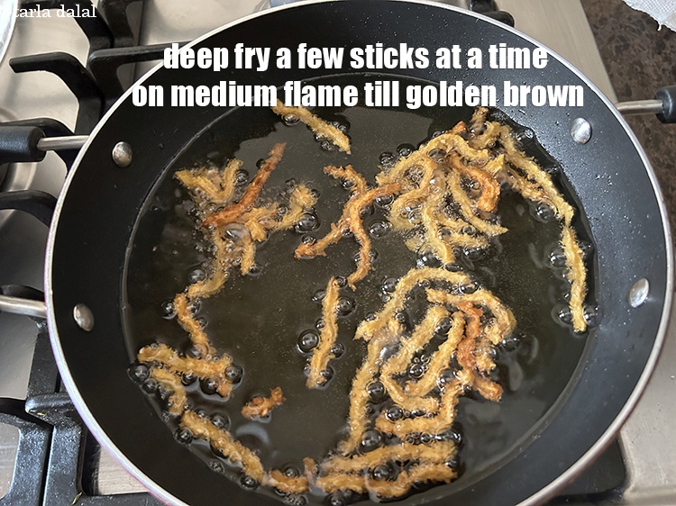 Step 23 – Deep-fry the sticks, a few at a time on a medium flame till golden brown.