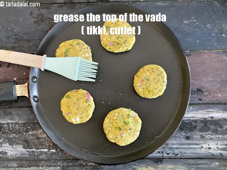 Step 28 – <meta charset="UTF-8" />Grease the top of the tikki.&nbsp;<br /> &nbsp;