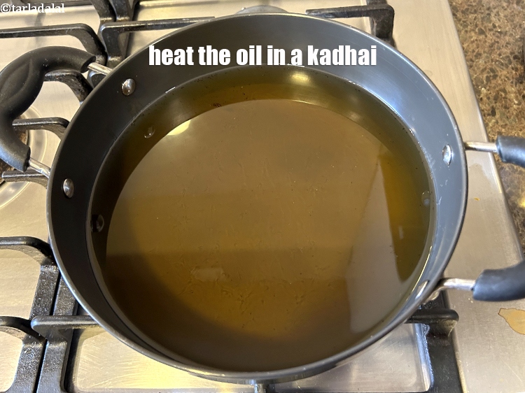 Step 22 – Heat the oil in a deep non-stick kadhai.