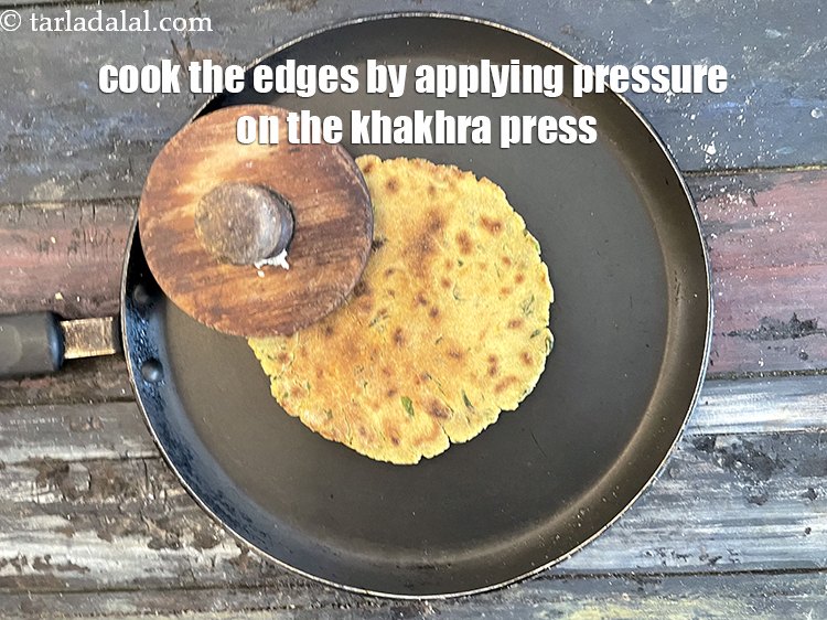 Step 22 – Remember to cook the edges of the khakhra by applying pressure with the khakhra press. …
