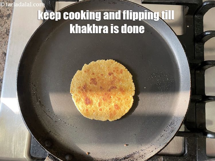 Step 26 – You will have to keep cooking the khakhra and flipping it till done.