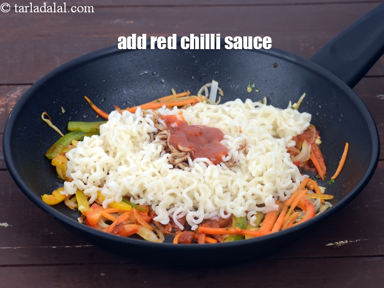 Step 22 – Add 4 tsp&nbsp;<a href="https://www.tarladalal.com/glossary-red-chilli-sauce-lal-chilli-sauce-810i">red chilli sauce</a>.&nbsp;