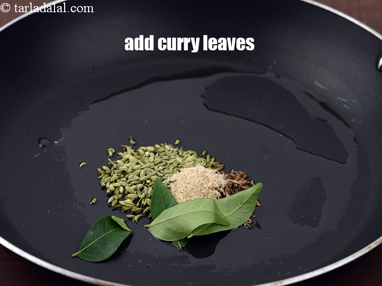 Step 21 – Add 4 <a href="https://www.tarladalal.com/glossary-curry-leaves-kadi-patta-kadipatta-388i">curry leaves (kadi patta)</a>.