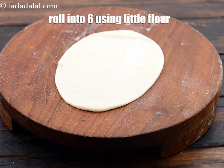 स्टेप 22 – थोड़े से मैदा का प्रयोग करते हुए इसे 150 मि.मी. …