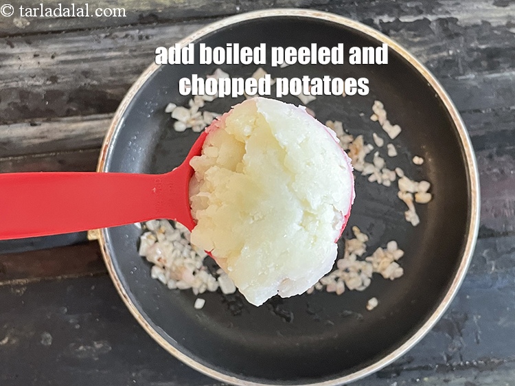 Step 22 – Add&nbsp;<meta charset="UTF-8" />1/4 cup&nbsp;boiled , peeled and&nbsp;<a href="glossary-chopped-potatoes-787i">chopped potatoes</a>.