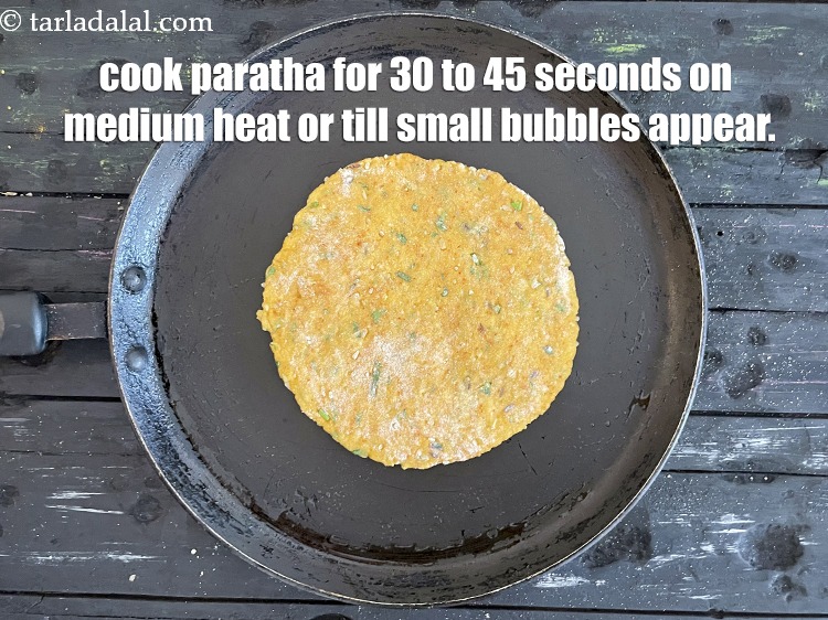 Step 23 – Cook paratha for 30 to 45 seconds on a medium flame.