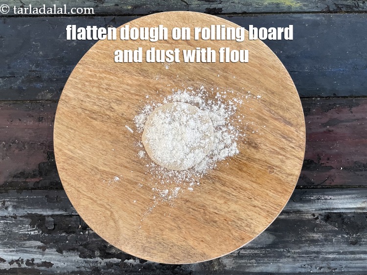 Step 24 – <meta charset="UTF-8" />Flatten the dough on a rolling board and dust with flour.&nbsp;&nbsp;