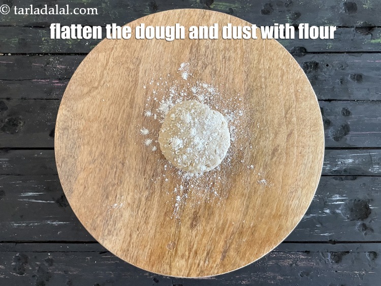 Step 24 – Flatten the dough and dust it with flour.