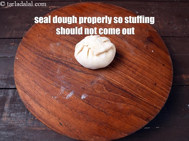 Step 22 – Seal the dough properly so that the stuffing should not come out.