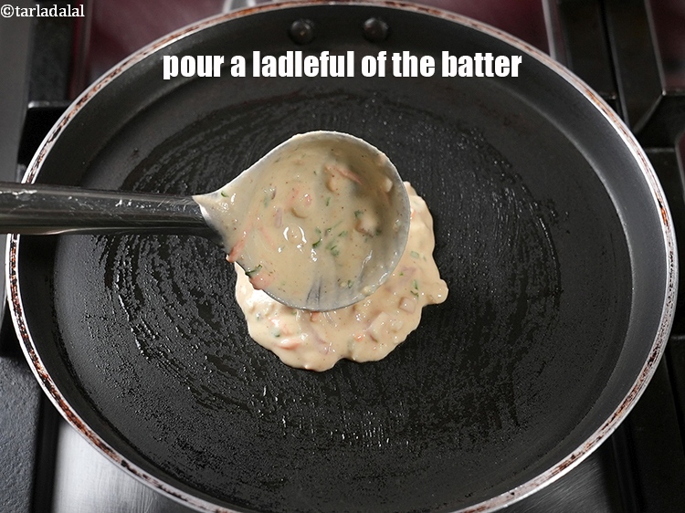 Step 22 – Pour a ladleful of the batter.