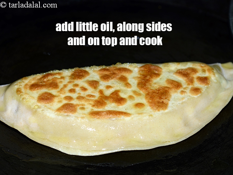 Step 23 – Add a little oil, along the sides and on top, flip and cook evenly till …