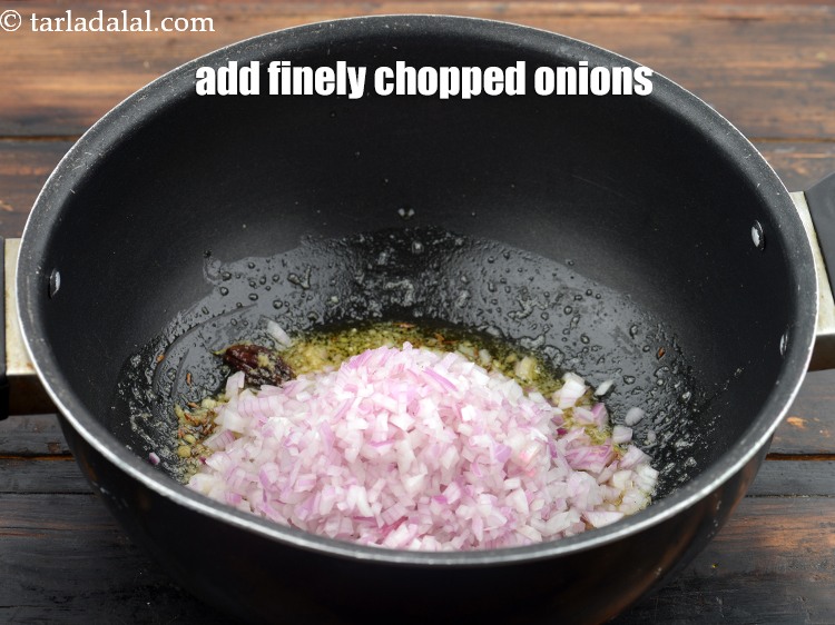 Step 23 – Add 1&nbsp;cup&nbsp;finely&nbsp;<a href="https://www.tarladalal.com/glossary-chopped-onions-722i">chopped onions</a>.