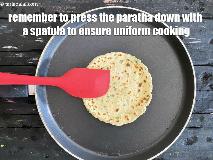 Step 27 – <meta charset="UTF-8" />Remember to press the roti down with a spatula while cooking. Press gently …