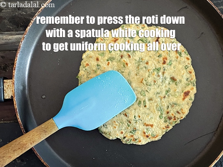 Step 23 – <meta charset="UTF-8" />Remember to press the roti down with a spatula while cooking. Press gently …