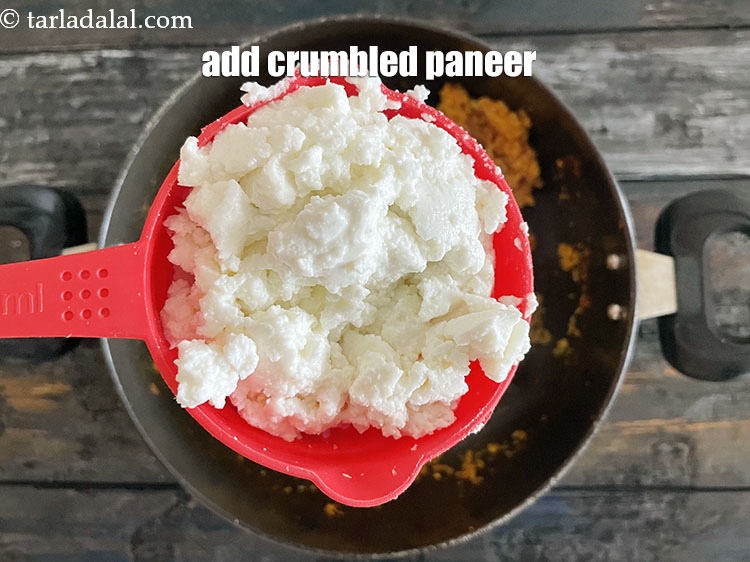 Step 25 – Add&nbsp;<meta charset="UTF-8" />1 cup&nbsp;<a href="glossary-crumbled-low-fat-paneer-1117i">crumbled low-fat paneer (cottage cheese)</a>.
