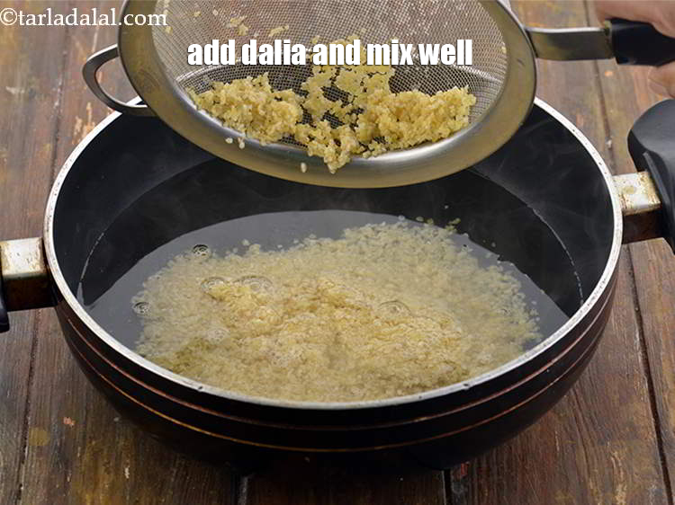 Step 8 – <meta charset="UTF-8" />Add the Dalia to it and mix well.&nbsp;