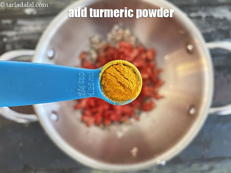 Step 31 – Add&nbsp;1/4 tsp&nbsp;<a href="glossary-turmeric-powder-haldi-645i">turmeric powder (haldi)</a>.