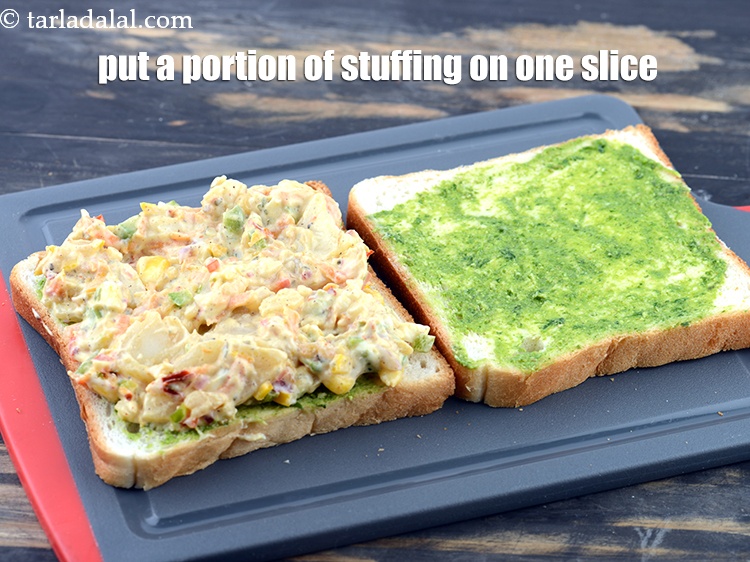 Step 21 – Put a portion of the stuffing on one slice.