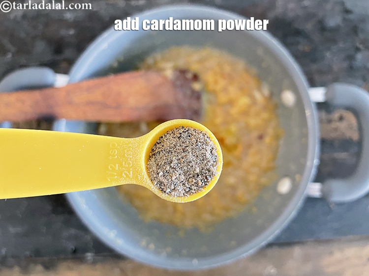 Step 29 – <html><head></head><body><p>Add&nbsp;1/2 tsp&nbsp;<a href="glossary-cardamom-powder-elaichi-powder-265i">cardamom (elaichi) powder</a>.</p></body></html>