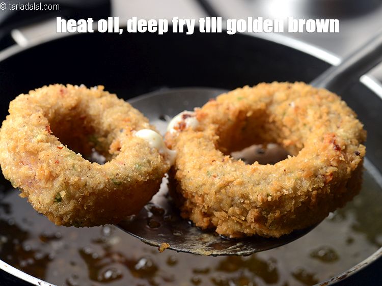 Step 23 – Heat oil in a deep pan, deep fry few onion rings at a time till …
