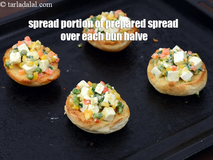 Step 21 – Spread a portion of the prepared chunky vegetable spread over each bun halve.