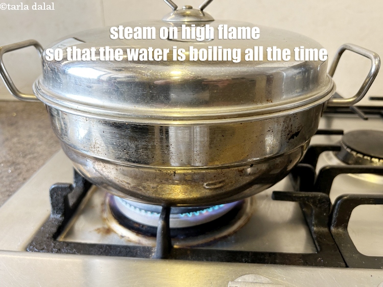 Step 23 – <meta charset="UTF-8" />Make sure you steam the idlis on high flame so that the water …