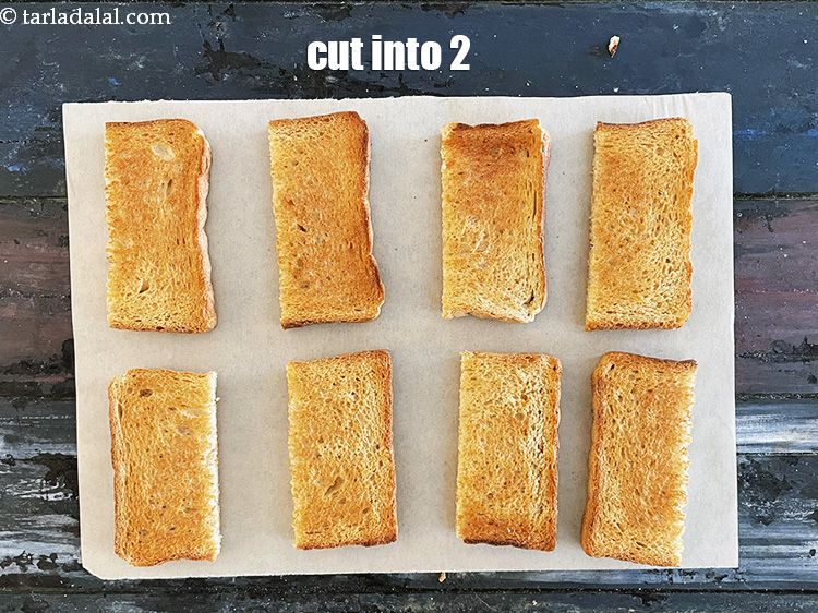 Step 29 – Cut each toast into 2 sliced and we are going to put the stuffing on …
