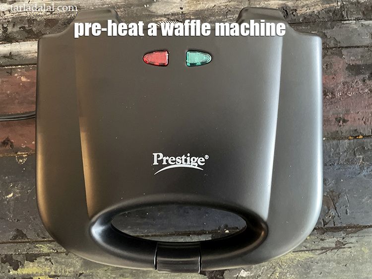 Step 26 – <meta charset="UTF-8" />Preheat the waffle machine.&nbsp;