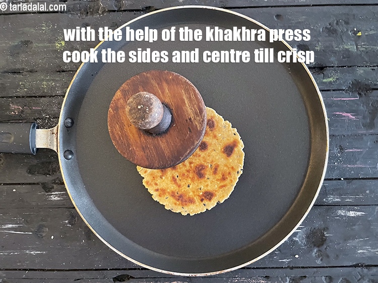 Step 29 – <meta charset="UTF-8" />With the help of a khakhra press or &nbsp;folded muslin cloth, press the …